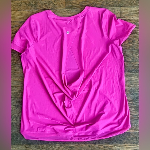 Lululemon short sleeve quick dry shirt. Size tag removed measures 6, NWOT. - Picture 3 of 7